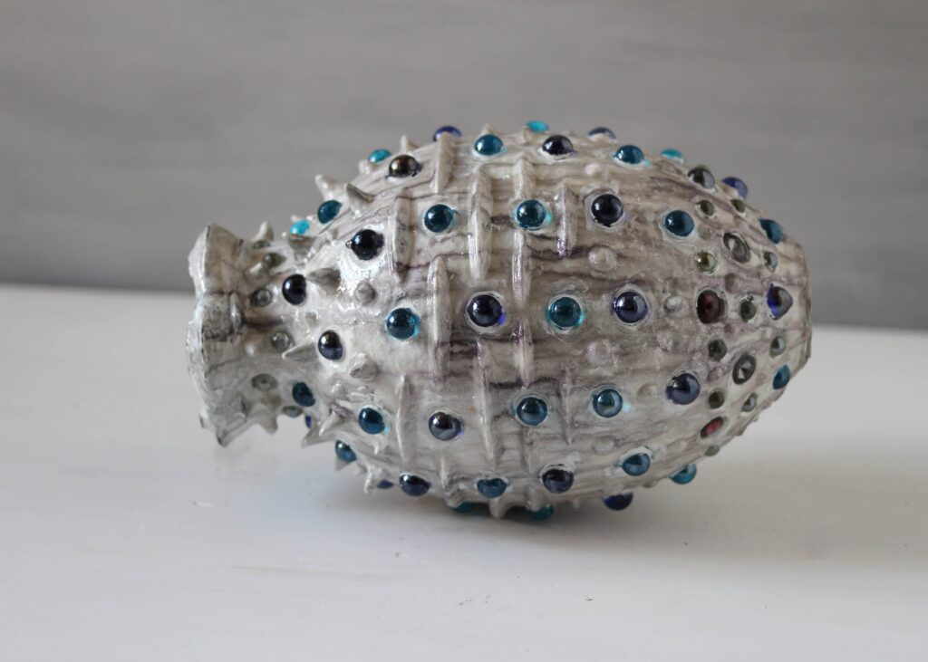 One-of-a-kind OOAK art vessel with glass accents and resin finish.