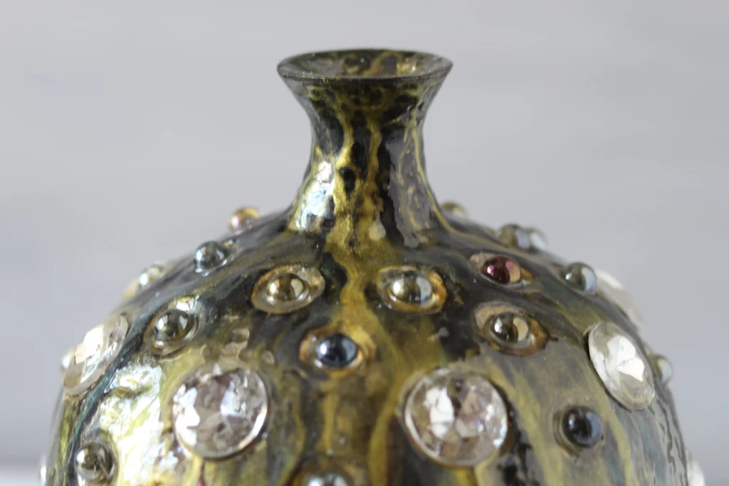 Golden black sculptural vase