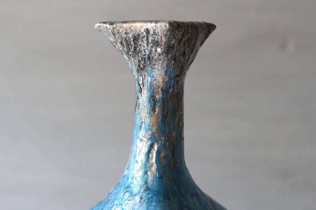 Geometric blue and silver sculptural vase, mica powder and epoxy resin art.