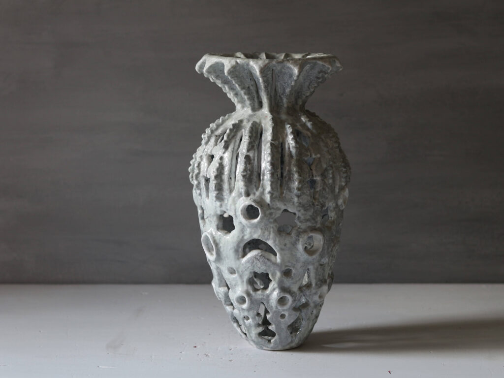Hand-sculpted palm tree inspired textural vase, organic mineral clay art.
