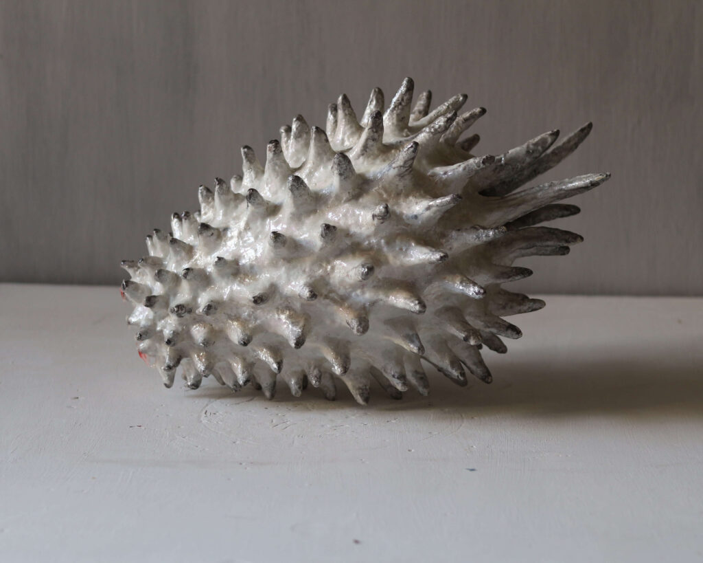 side view of sculptural urchin vase One-of-a-kind sculptural vases, unique mineral clay art. by MKS